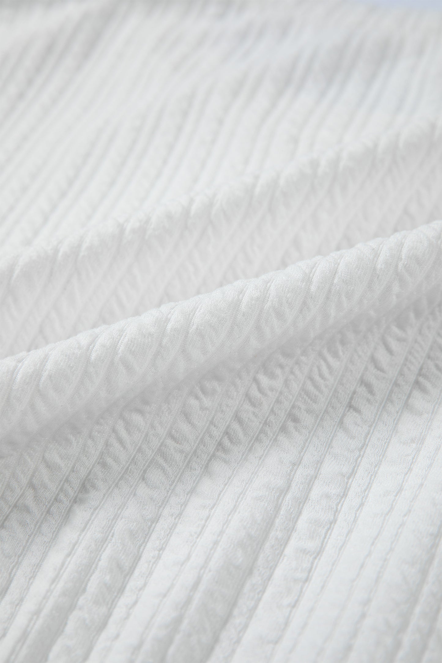 White Solid Color Textured Drop Shoulder Long Sleeve Peplum Top