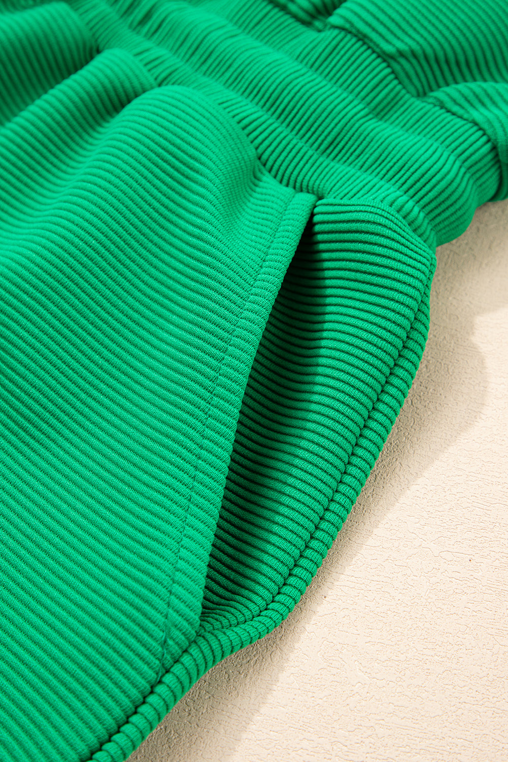 Bright Green Textured Short Sleeve Half Zip Drawstring Waist Romper