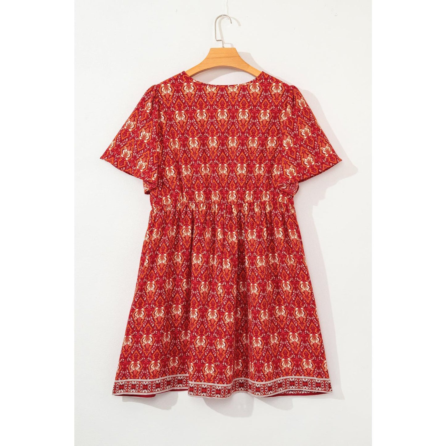 Orange Plus Size Printed Surplice Neck Empire Waist Flowy Mini Dress