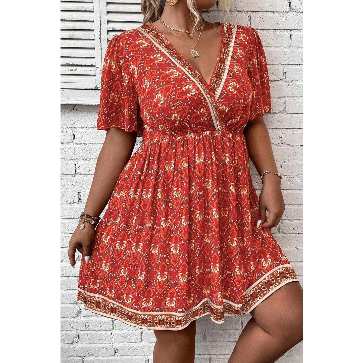 Orange Plus Size Printed Surplice Neck Empire Waist Flowy Mini Dress