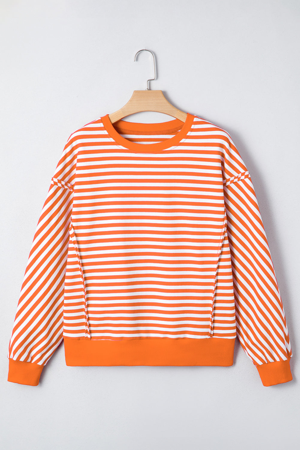 Orange Stripe Exposed Seam Drop Shoulder Casual Pullover Top