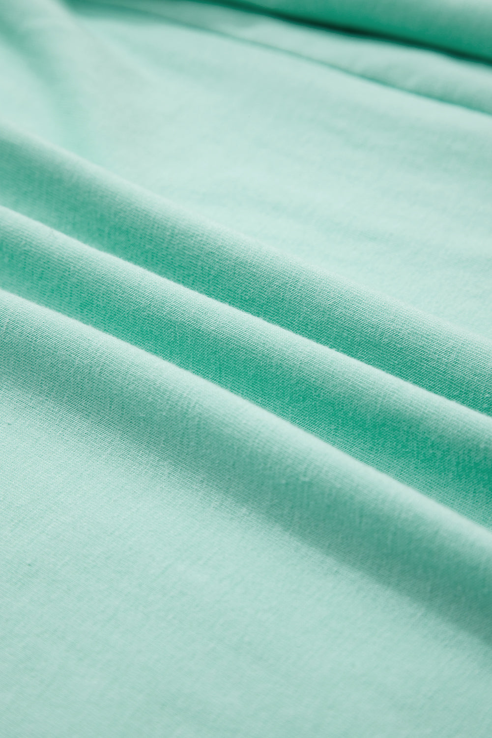 Moonlight Jade Solid Color Pocketed Raw Edge Babydoll Dress